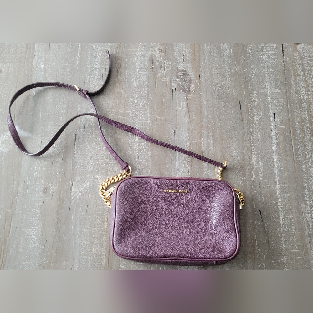 Michael Kors Ginny Medium Crossbody Bag in a plum Color